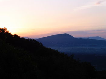 Scenic view of mountains at sunset