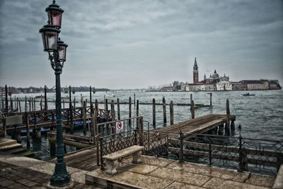 View of pier leading to lake