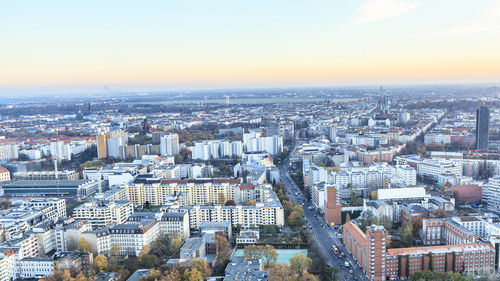 Aerial view of cityscape against sky