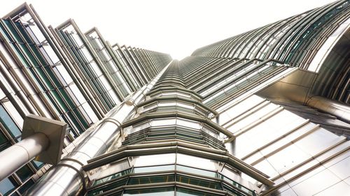 Low angle view of skyscraper against clear sky