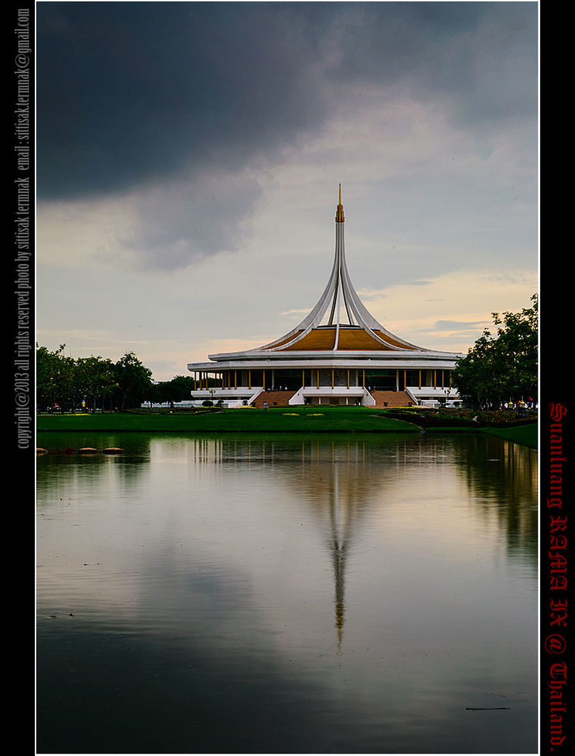 architecture, built structure, sky, water, tree, reflection, building exterior, cloud - sky, waterfront, travel destinations, river, famous place, tourism, outdoors, cloud, religion, travel, incidental people, lake, cloudy