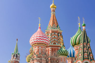 St basil's cathedral on red square in moscow. domes the cathedral lit by the sun