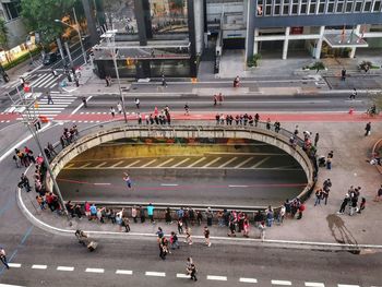 High angle view of people on road in city