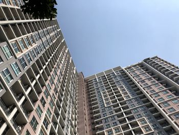 Low angle view of modern buildings against clear sky