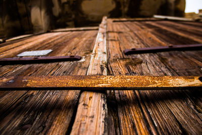 Close-up of old wooden bench