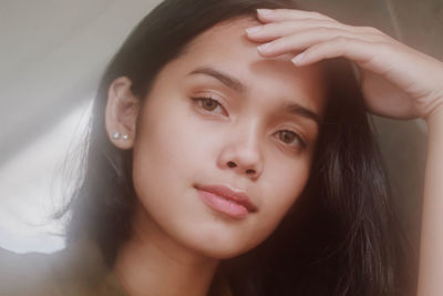 Close-up portrait of young woman