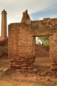 Old ruins of building against sky