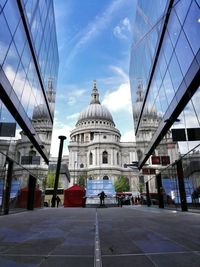 View of buildings against cloudy sky