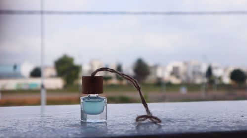 Close-up of water on table against wall