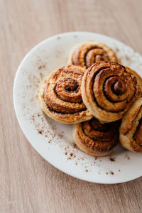 High angle view of cookies in plate on table