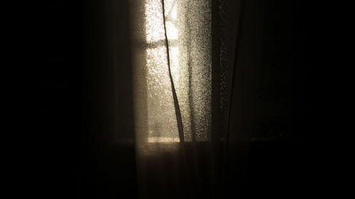 View of curtains in the dark