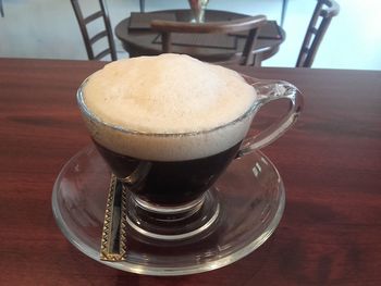 Close-up of coffee cup on table