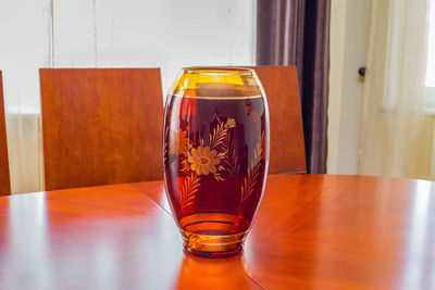 Close-up of beer glass on table