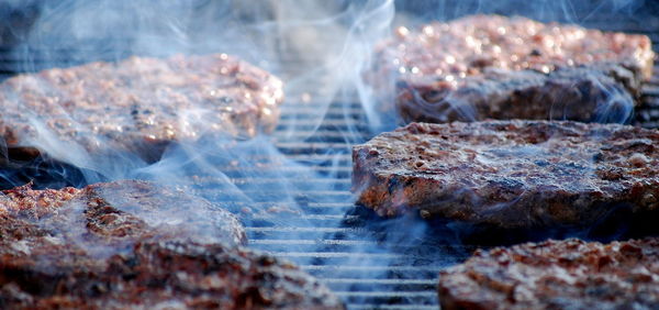 Close-up of meat on barbecue grill