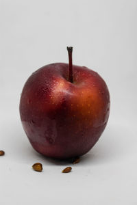 Close-up of apple against white background