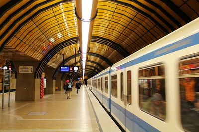 People at railroad station platform