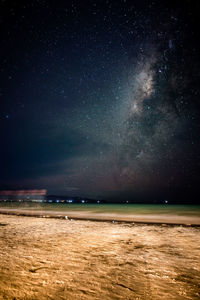 Scenic view of star field against sky at night