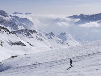 Scenic view of snowcapped mountain against sky