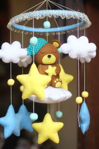 Close-up of stuffed toy hanging