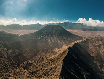 Scenic view of volcanic landscape against sky