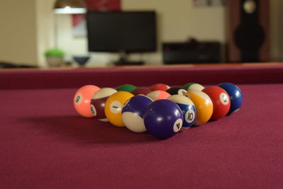 Multi colored balls on table