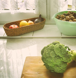 High angle view of fruits in basket on table