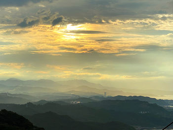 Scenic view of landscape against sky during sunset