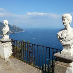 Scenic view of sea against blue sky