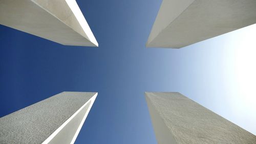 Low angle view of building against blue sky