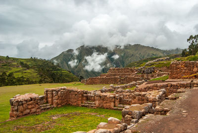 Scenic view of mountain against cloudy sky