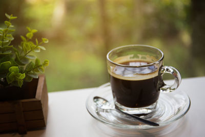 Close-up of coffee cup on table