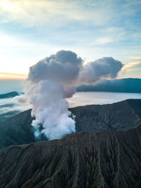 Panoramic view of volcanic landscape against sky