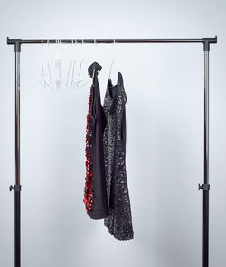 Close-up of clothes hanging on rack