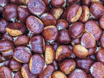 Chestnuts in market during rain