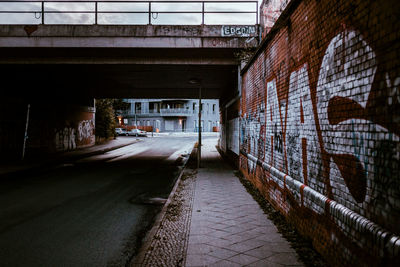 Narrow alley along buildings