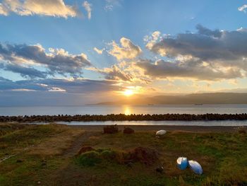 Scenic view of sea against sky during sunset