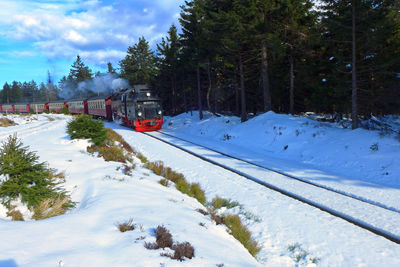 Train on snow covered landscape