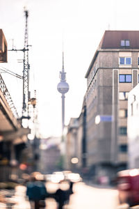 View of communications tower in city