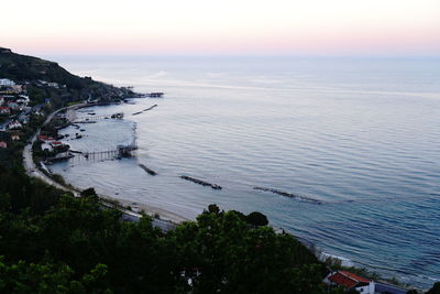 High angle view of sea against sky during sunset