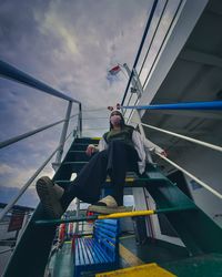 Woman with a view of the sky above the ship