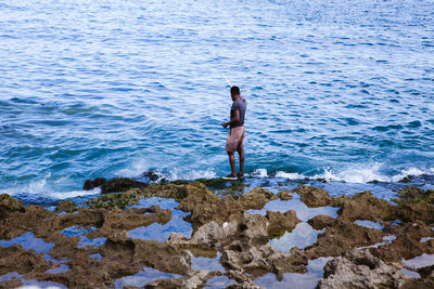 Full length of man swimming in sea