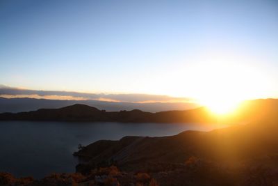 Scenic view of mountains against sky during sunset