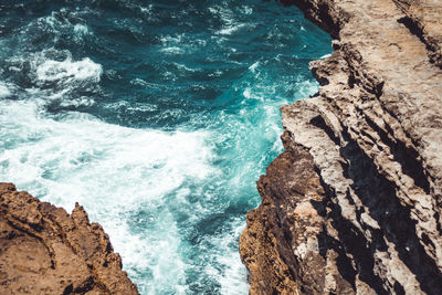 High angle view of rocks on beach