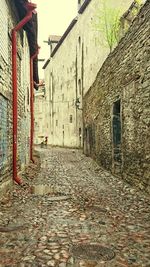 Narrow alley along buildings