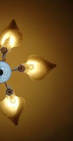 Digital composite image of illuminated light bulb