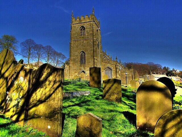 architecture, built structure, religion, blue, building exterior, place of worship, spirituality, clear sky, church, history, sky, low angle view, cross, the past, tower, old, sunlight, grass