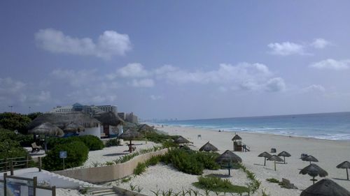 Scenic view of beach against sky