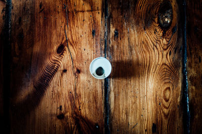 Directly above shot of drink on wooden table