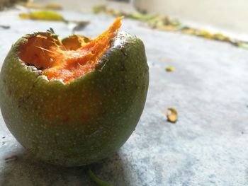 Close-up of orange slice on table