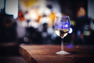 Close-up of wine glass on table